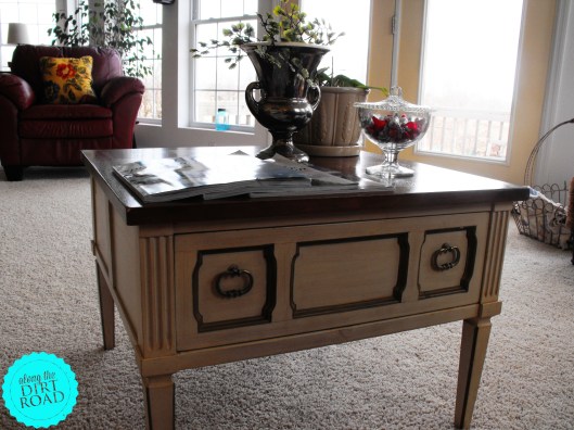 Do you remember this?  My husband bought it for me at an auction...(good eye Mr....good eye) and I talked him into cutting the legs off...coffee table height...and can you say love?  :)